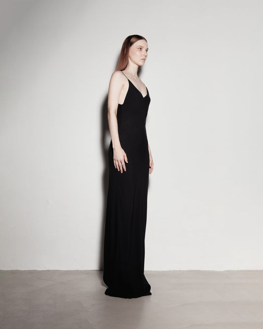 Max's dress with her back exposed. Black