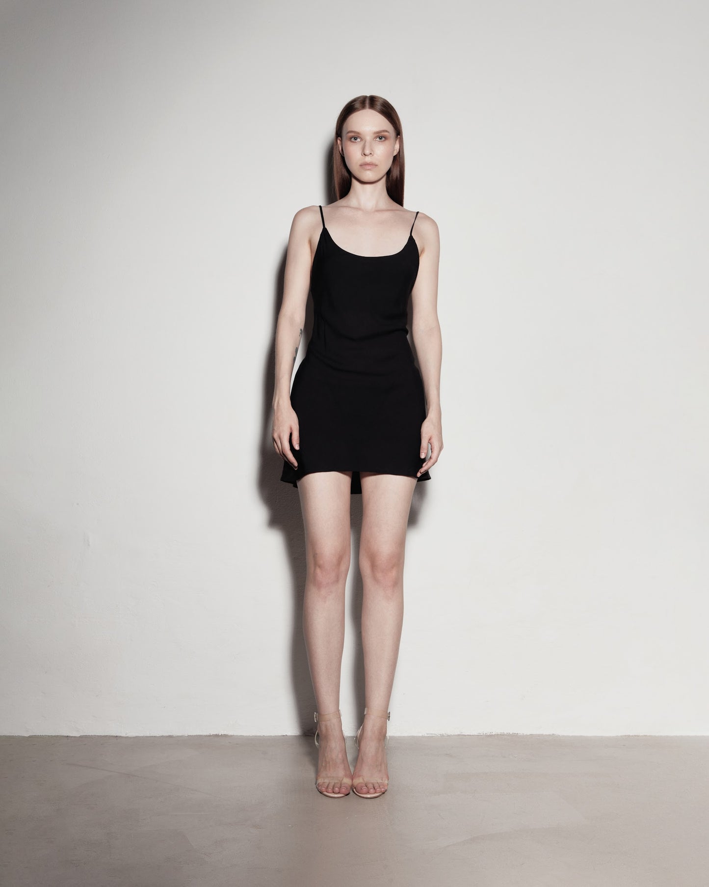 MINI dress with exposed back. Black