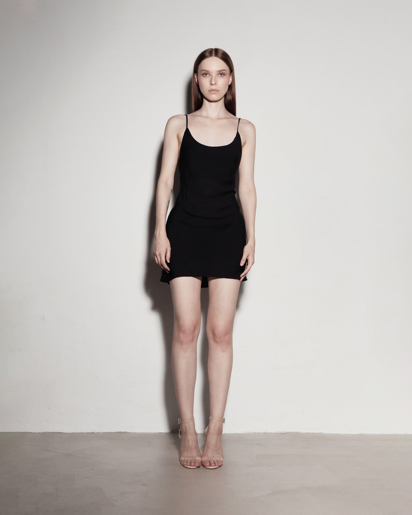 MINI dress with exposed back. Black