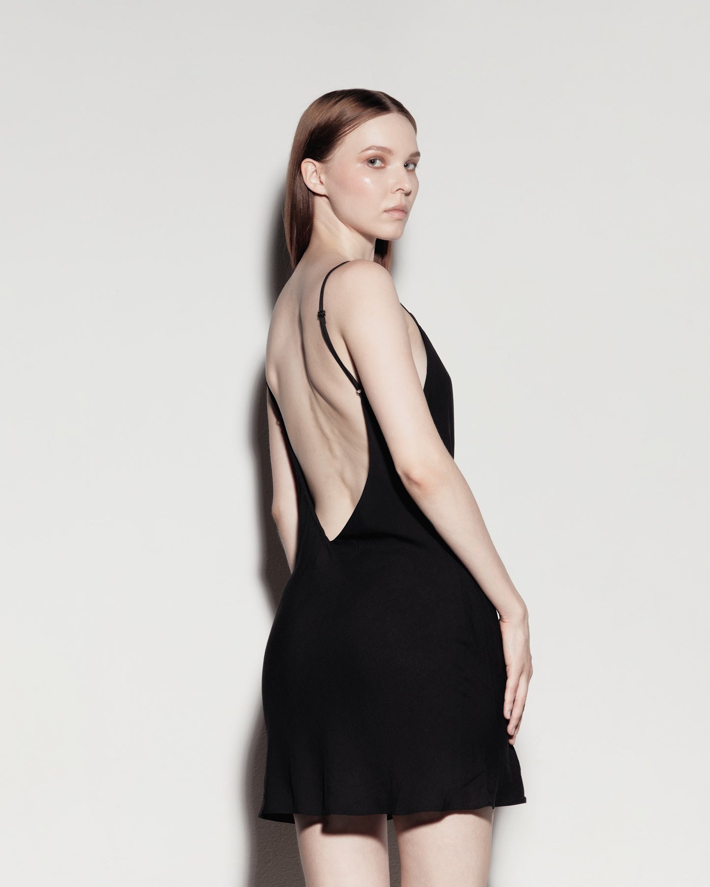 MINI dress with exposed back. Black